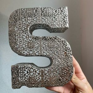 Decorative “S” letter